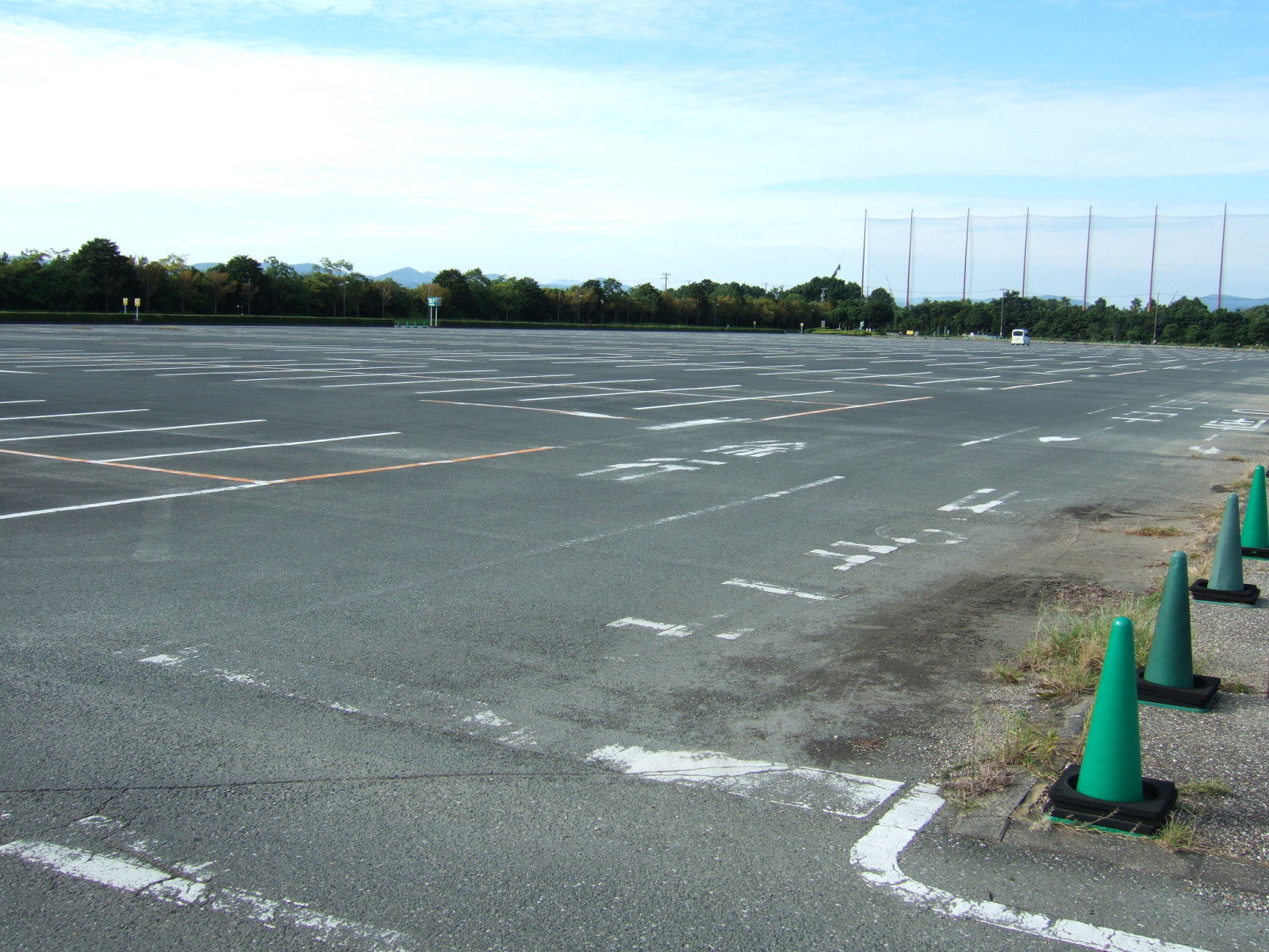 Large empty parking lot.